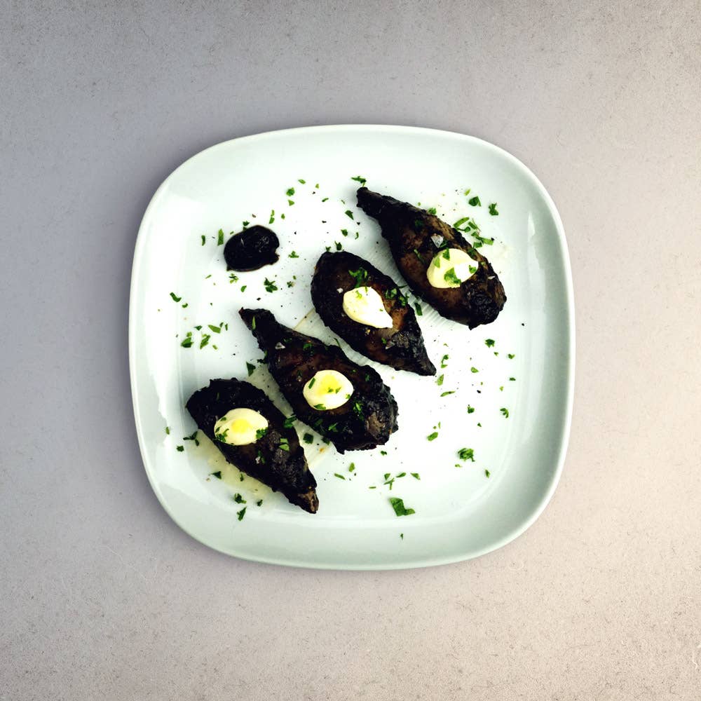 Stuffed Squid in Ink Sauce