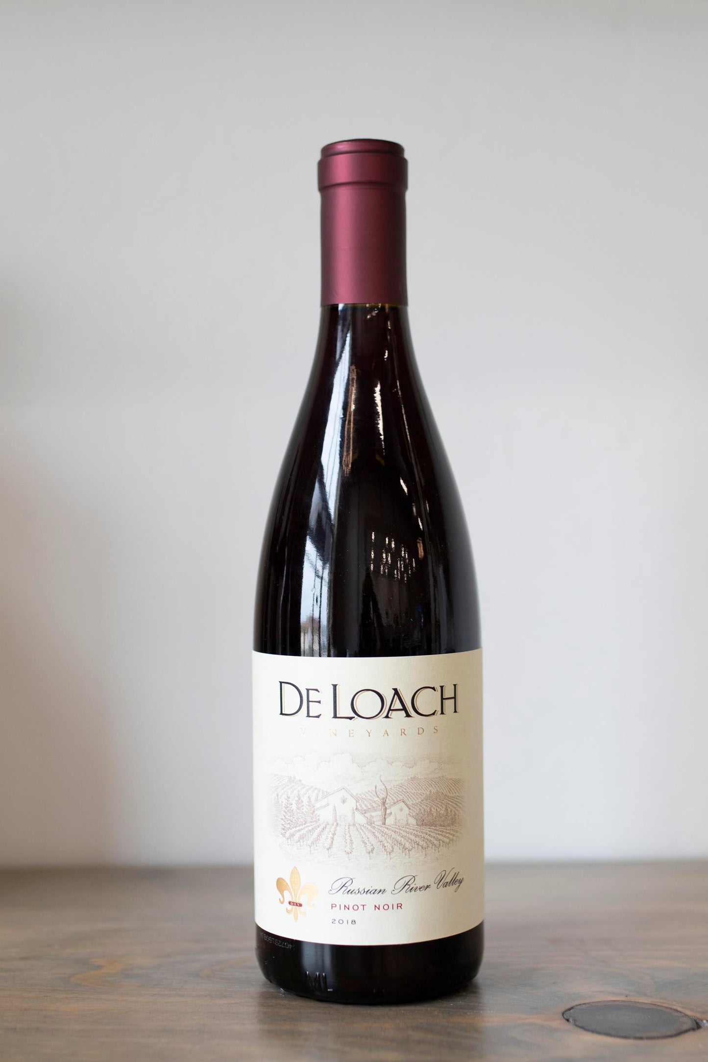 Bottle of Deloach Pinot noir found at Vine & Board in 3809 NW 166th St Suite 1, Edmond, OK 73012