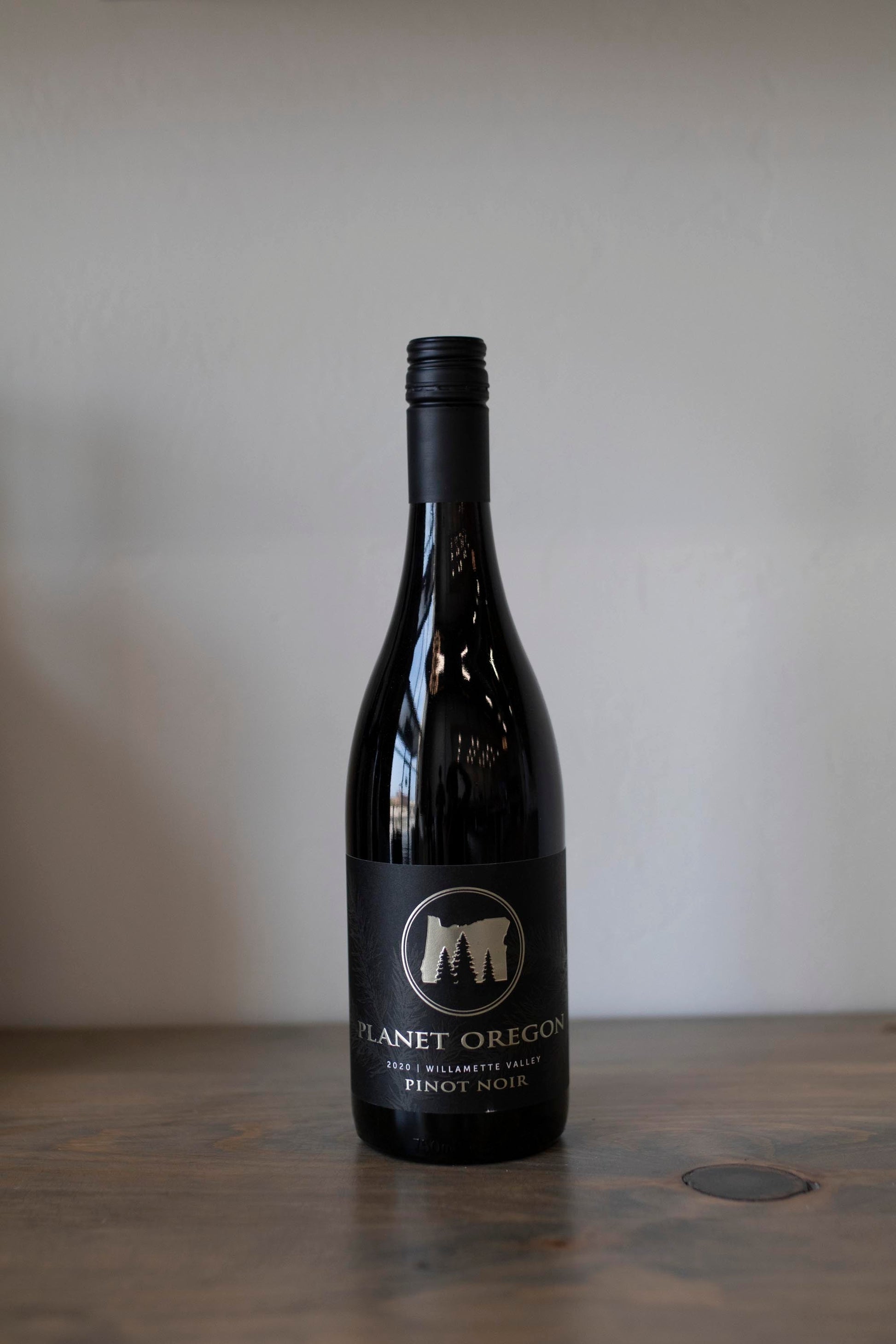 Bottle of Planet Oregon Pinot Noir found at Vine & Board in 3809 NW 166th St Suite 1, Edmond, OK 73012